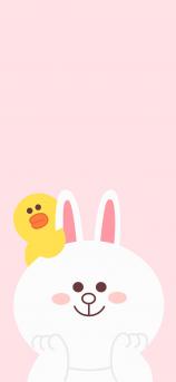 粉色背景可爱的小白兔和他肩膀上的大黄鸭手绘卡通手机壁纸