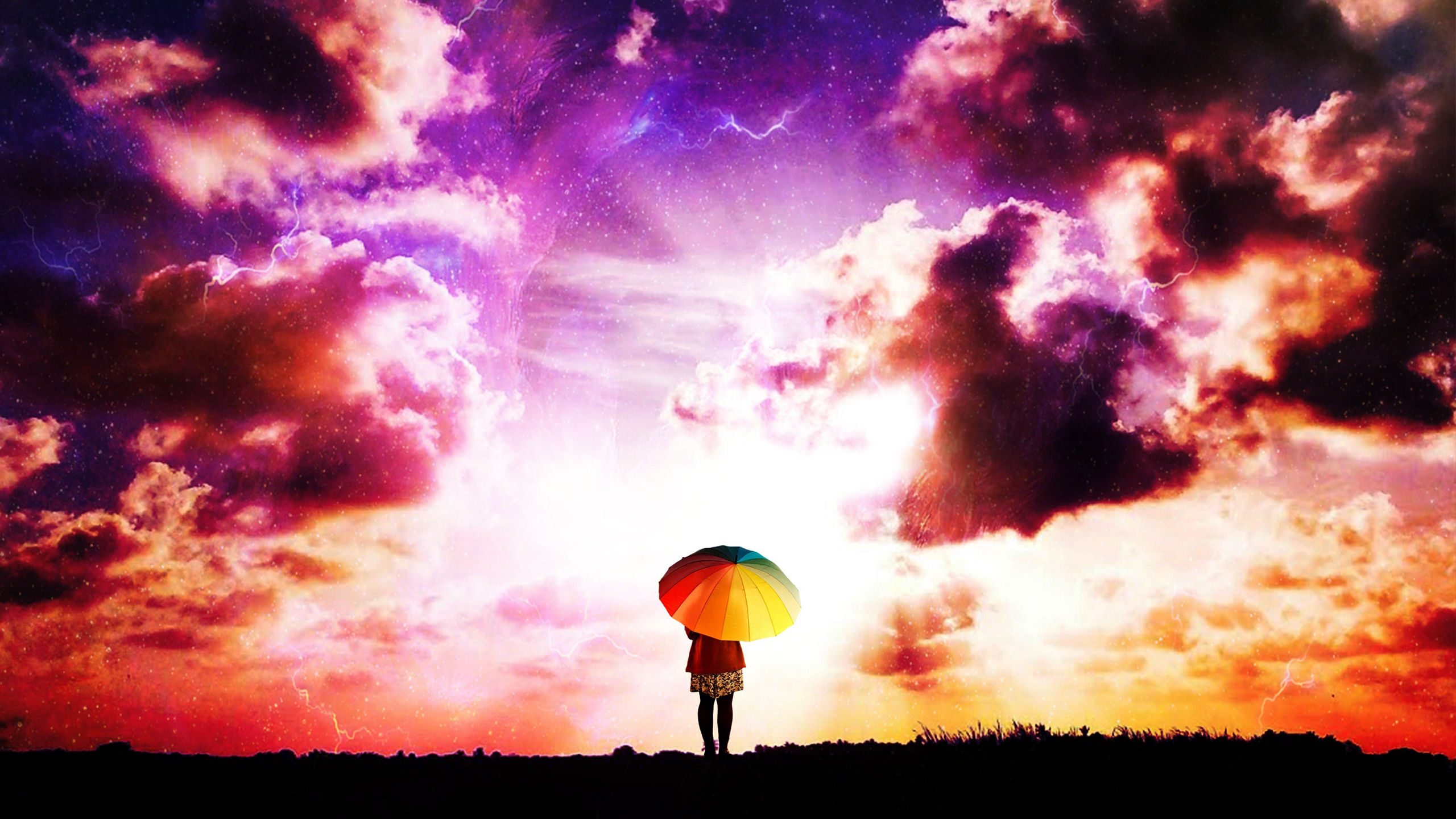 天空起舞的芭蕾舞者，炫彩云朵下拿着彩虹雨伞的人物梦幻唯美壁纸
