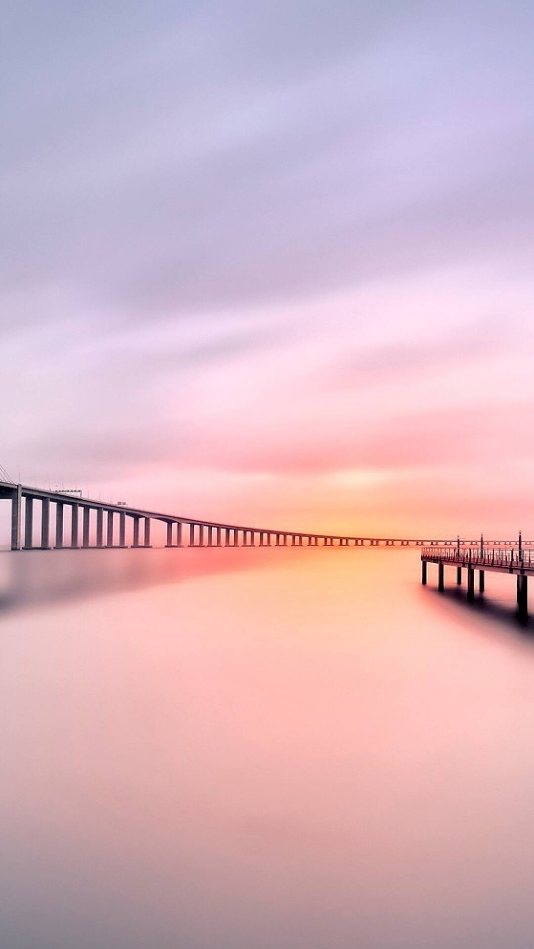 超清的夕阳下的跨海大桥摄影手机锁屏壁纸