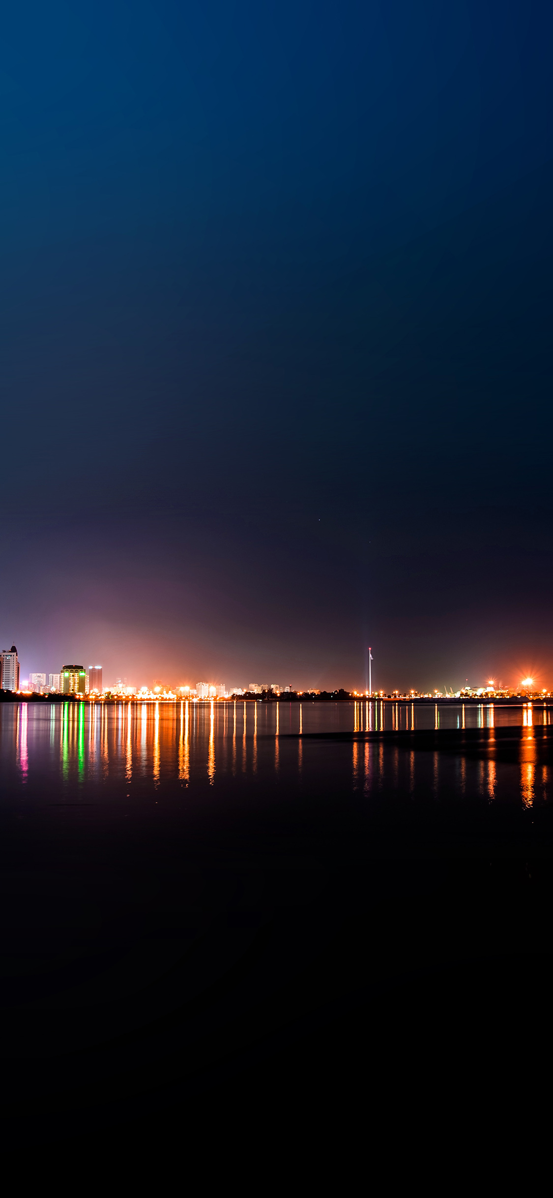 海滨城市的繁华夜景灯光高清手机壁纸